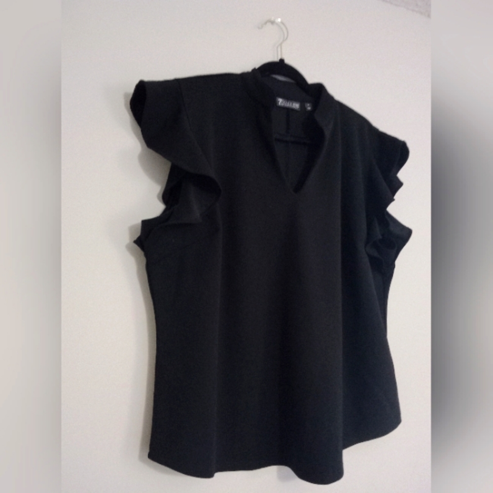 BLACK RUFFLE SLEEVELESS BLOUSE SIZE XL.